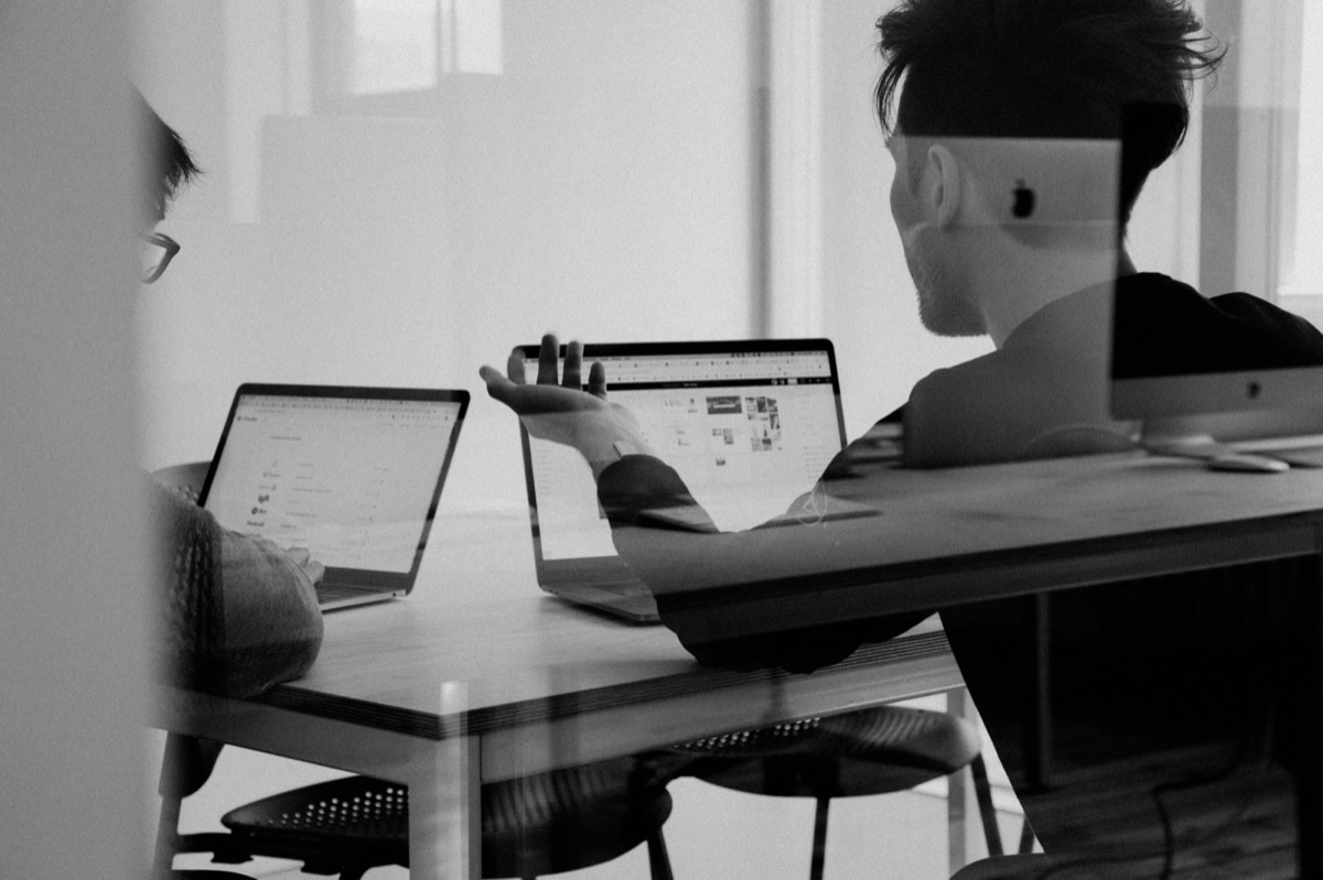 Executive and operations teams collaborating in a working session